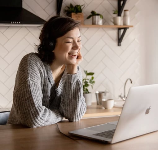 woman in video call at a desk