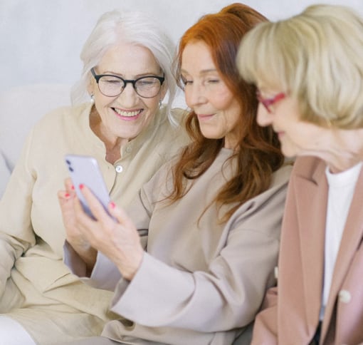 women videochatting and laughing